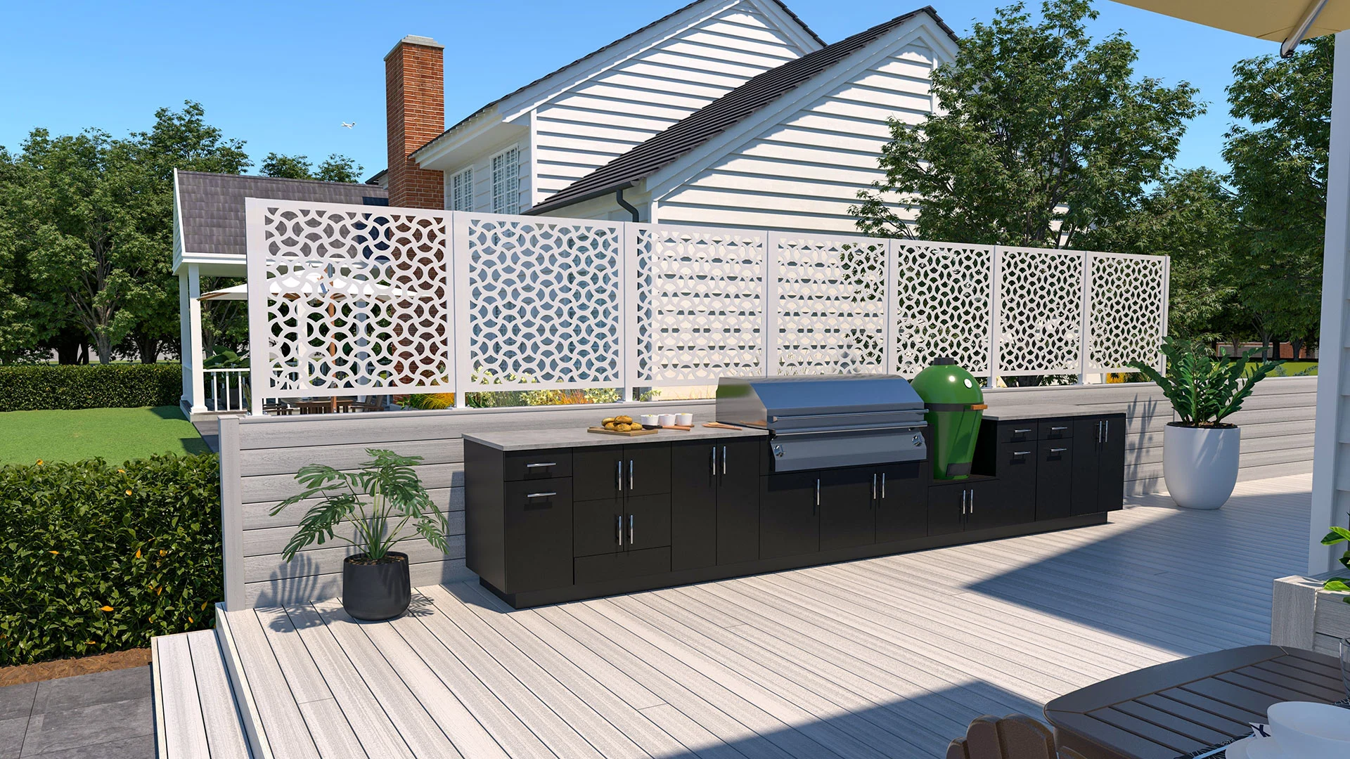 Trex Privacy screens are used create a privacy wall behind a Trex Outdoor Kitchen